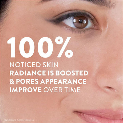 a woman's face with the words, 100 % noticed skin radiance