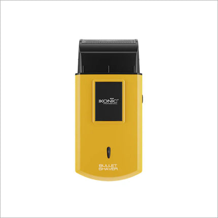 a yellow and black electric shaver on a white background