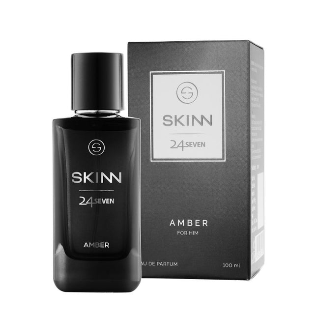 a bottle of skin cologne next to a box