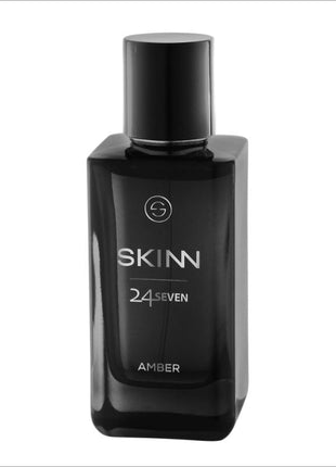 a bottle of skinn cologne on a white background