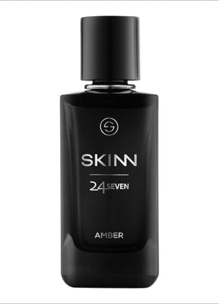 a bottle of skinn cologne on a white background