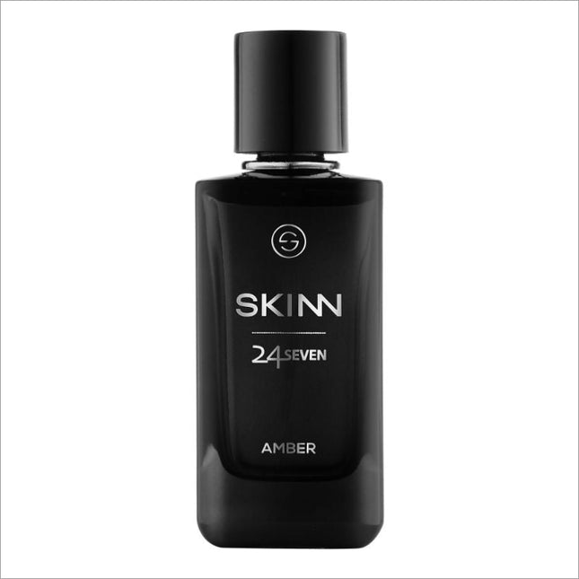 a bottle of skinn cologne on a white background