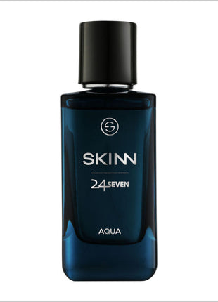 a bottle of skinn cologne on a white background