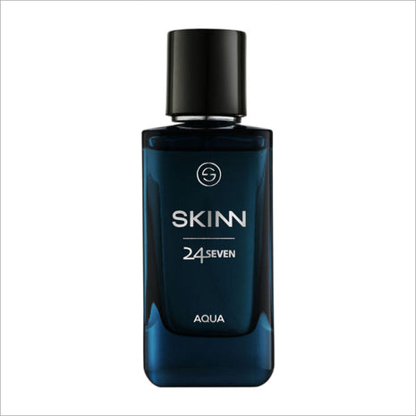 a bottle of skinn cologne on a white background