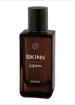 a bottle of skin cologne on a white background