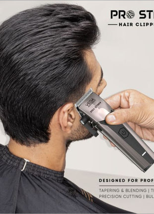 a man getting his hair cut with a clipper